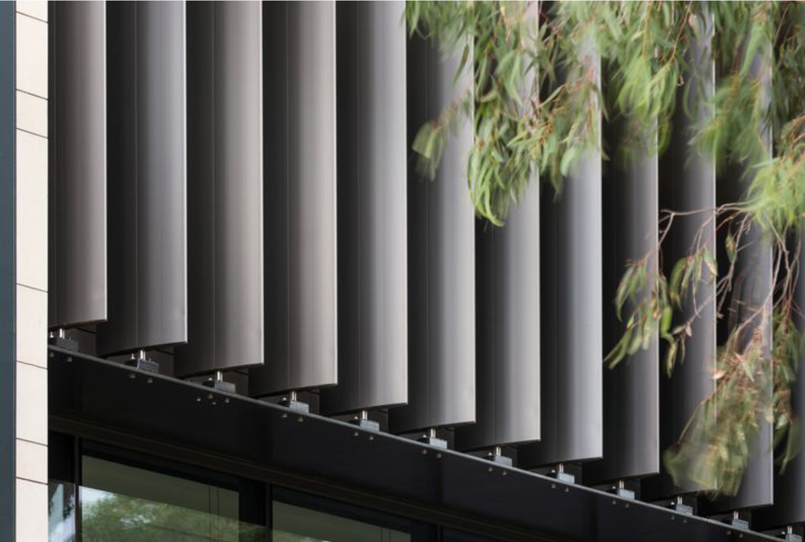 Elegant louvers by Axes in Excess, enhancing architectural spaces with visual impact.