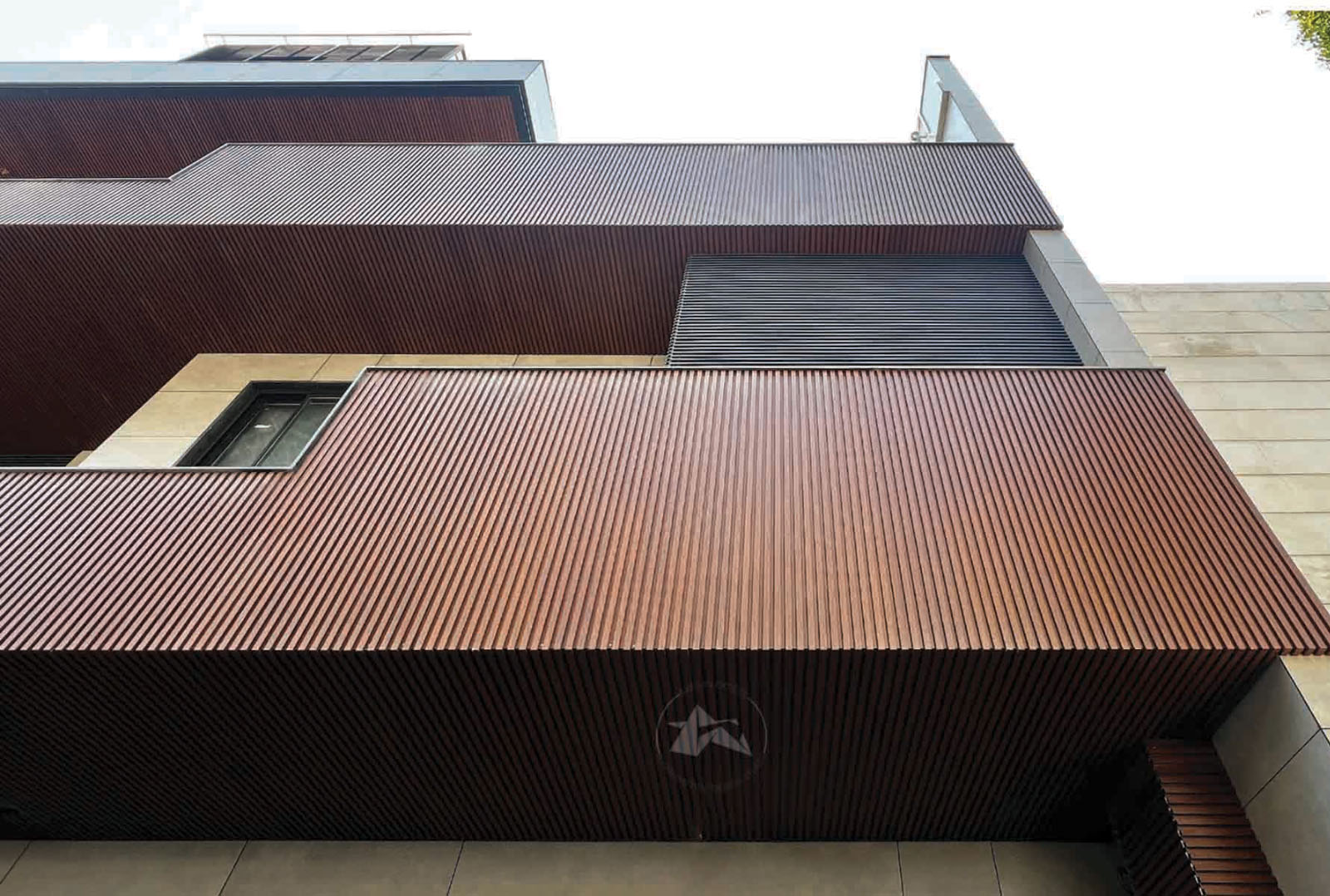 Sleek metal facade by Axes in Excess.