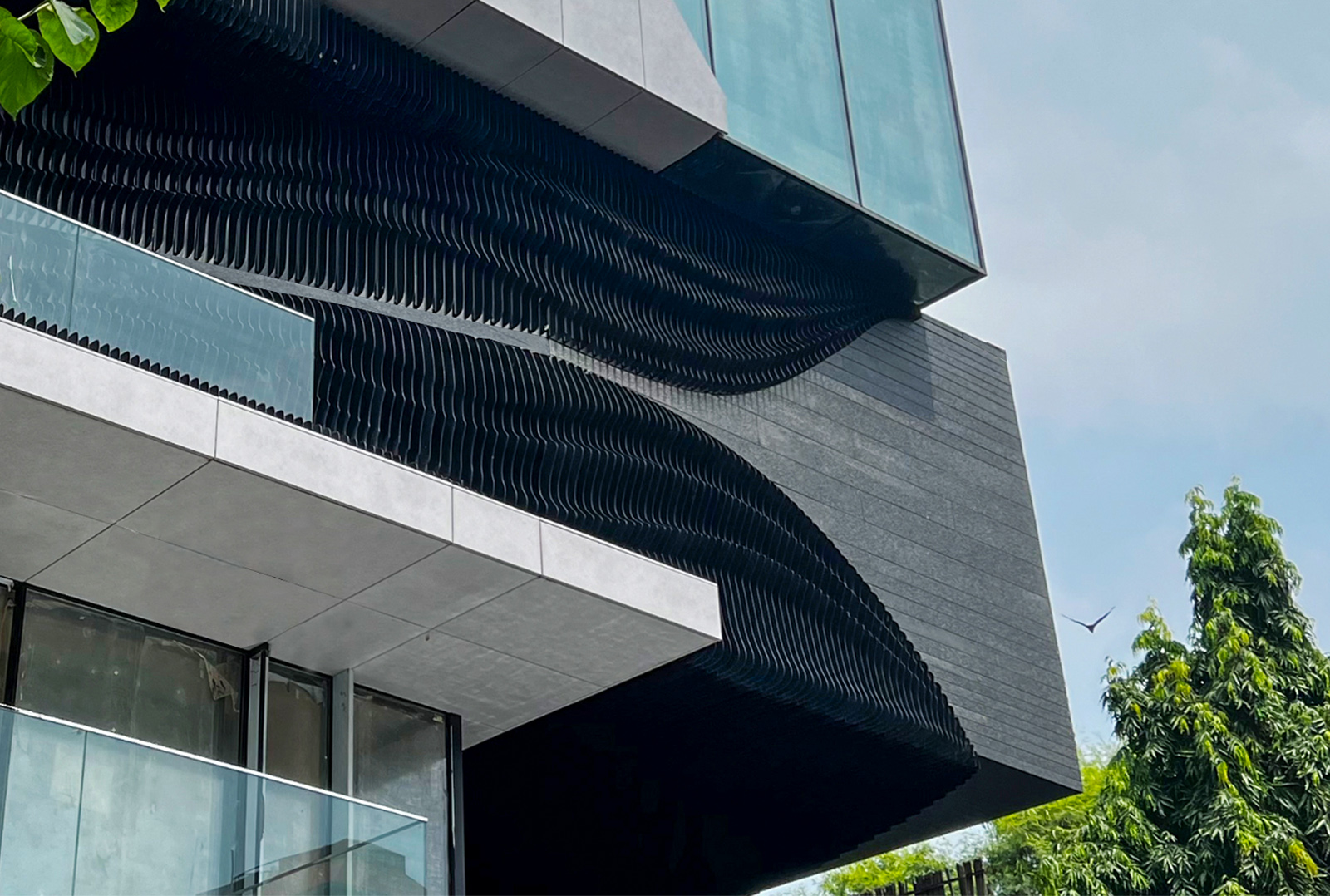 Axes in Excess parametric powder-coated aluminum facade screen