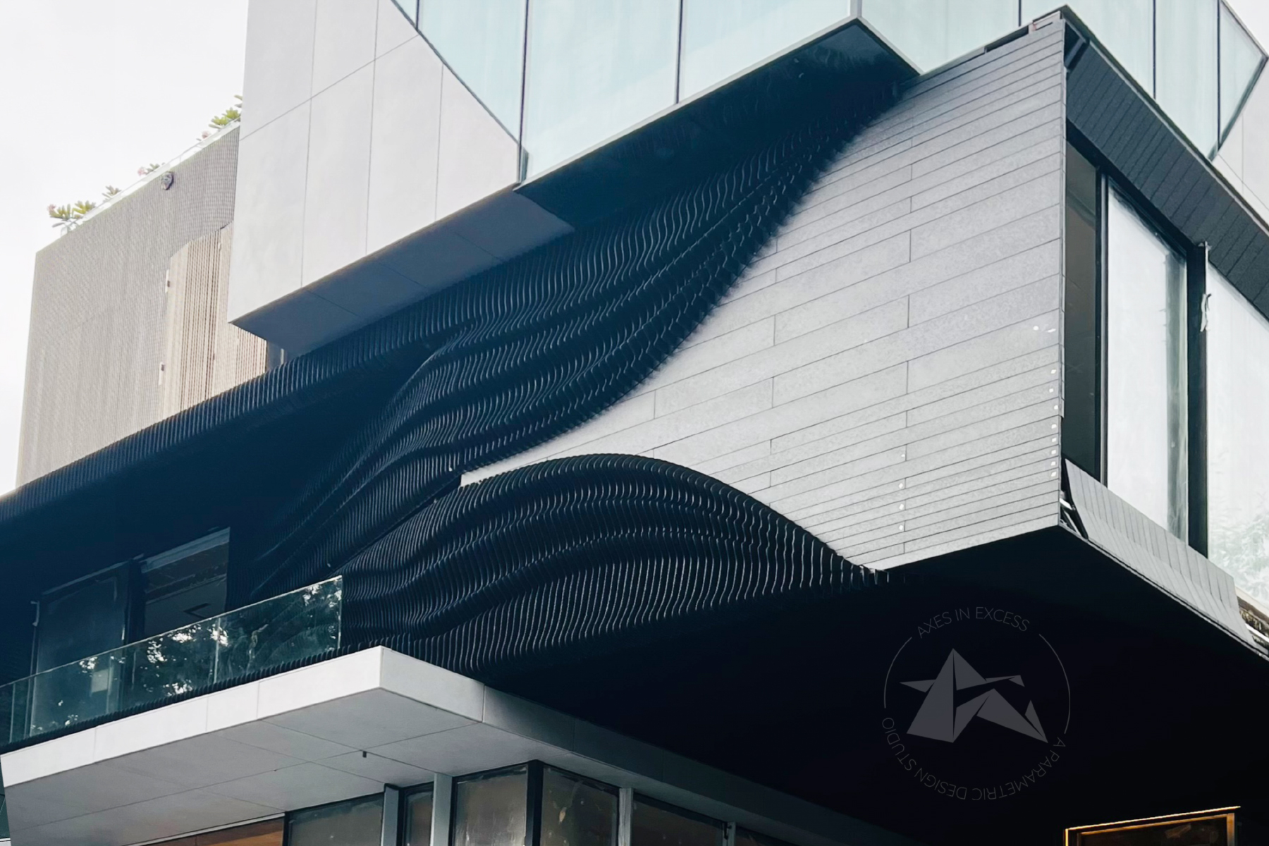 Sleek parametric metal facade for building by axes in excess